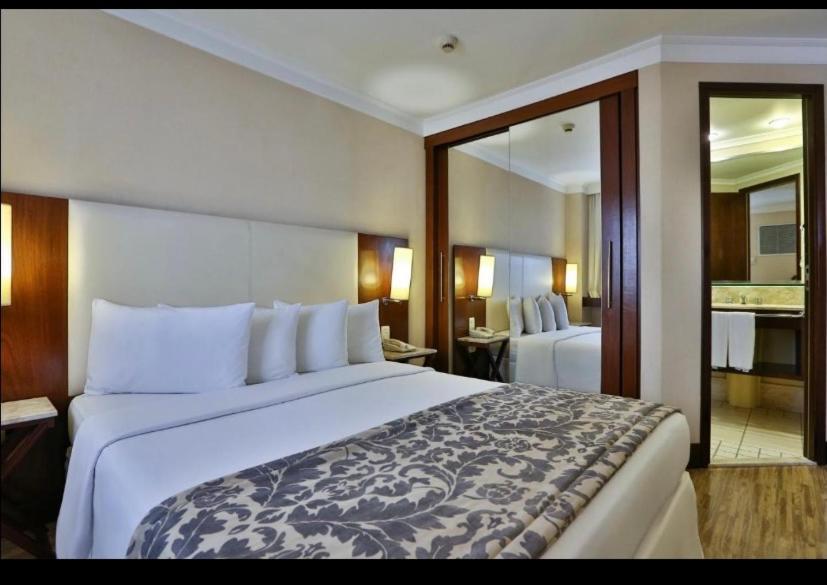 International Plaza Jardins Apartment