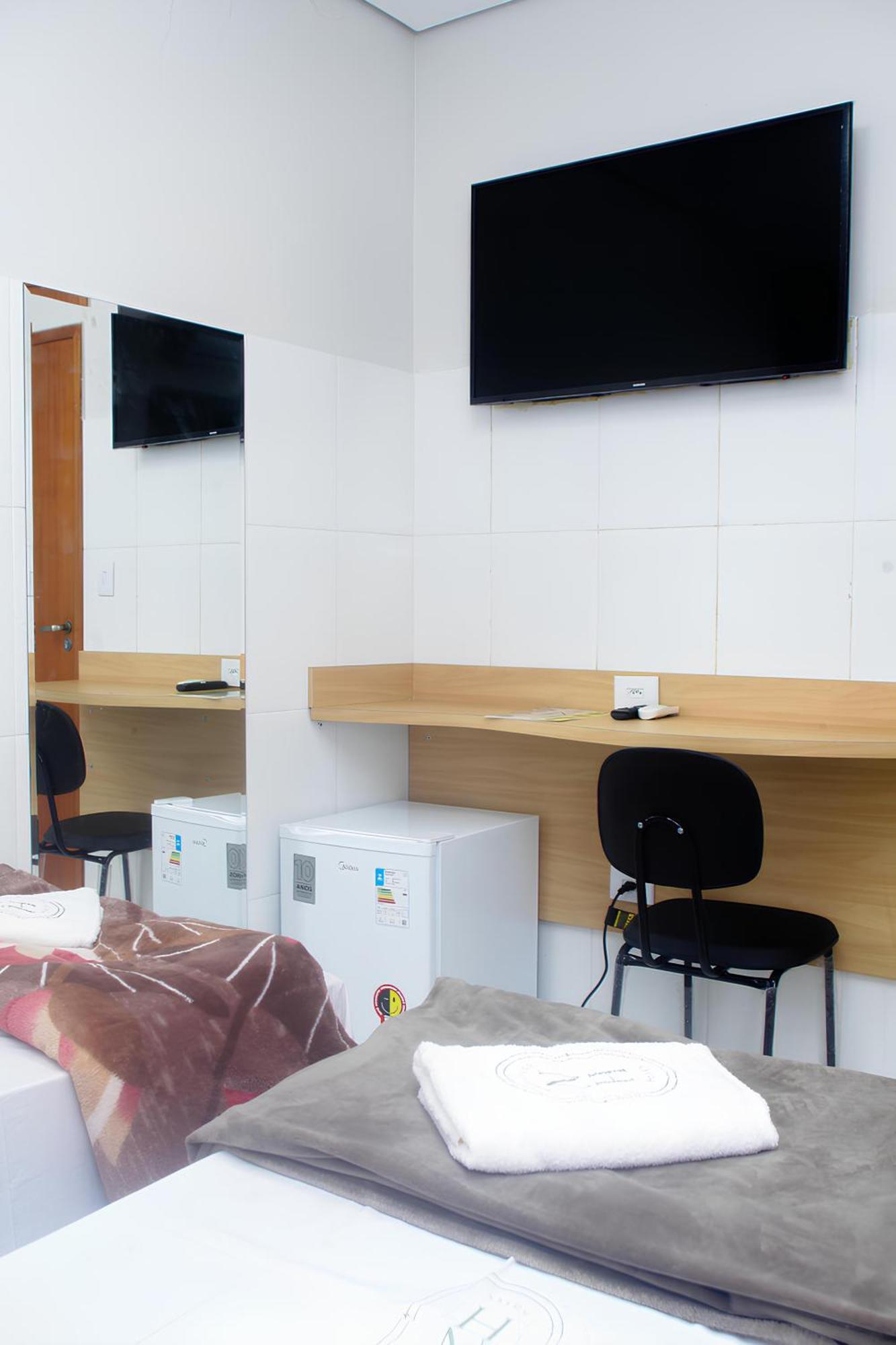 Hotel New House *