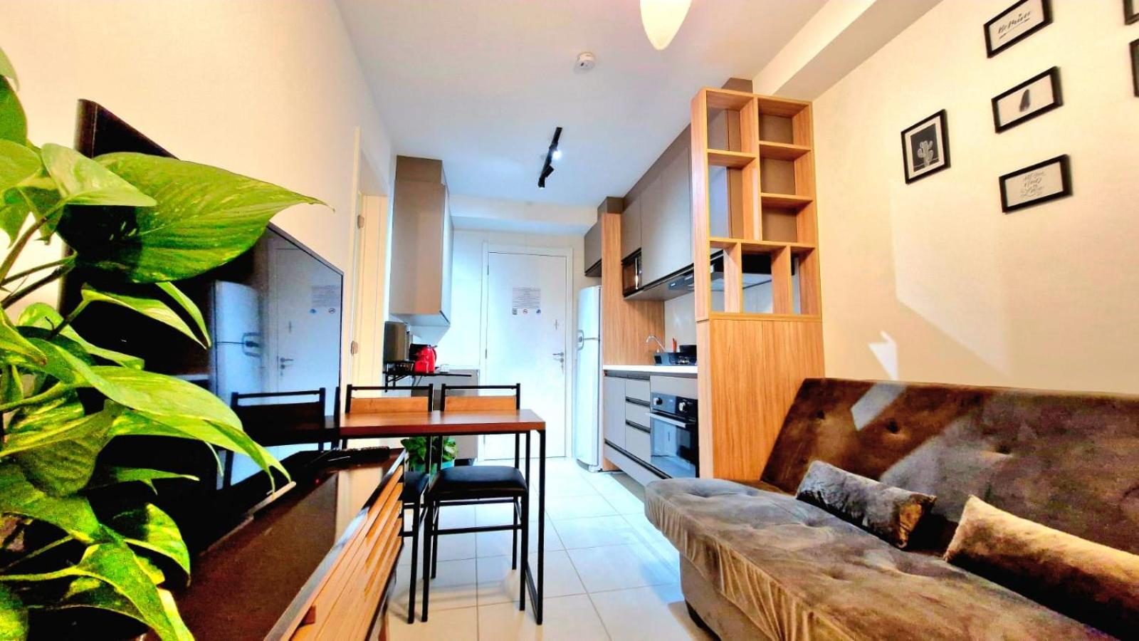 Apartemen Por Do Sol Desde Uma Rede Na Varanda Da Zona Sul
