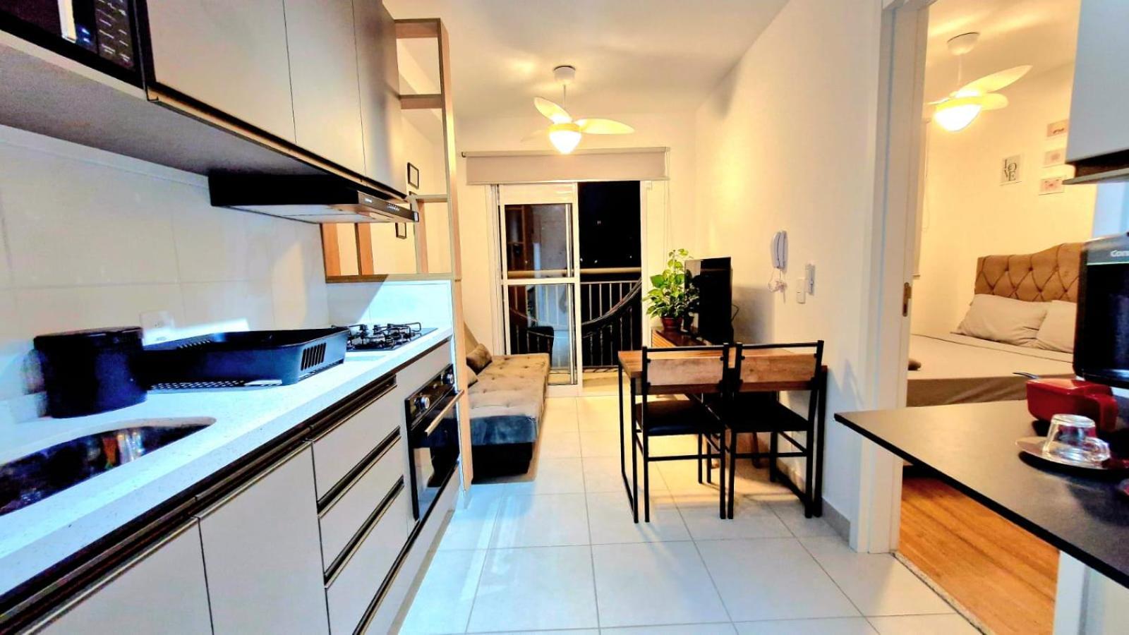 Apartemen Por Do Sol Desde Uma Rede Na Varanda Da Zona Sul *