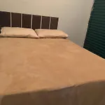 Quarto Individual Banheiro Compartilhado