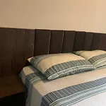 Quarto Individual Banheiro Compartilhado