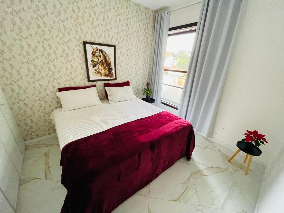 A Casa Que Hospeda Privatunterkunft *